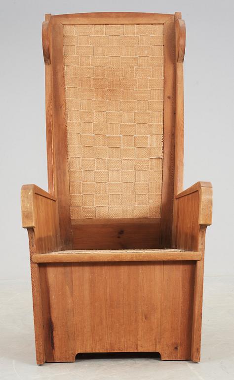 A stained pine armchair attributed to either Axel Einar Hjorth or David Rosén, Nordiska Kompaniet, ca 1932.