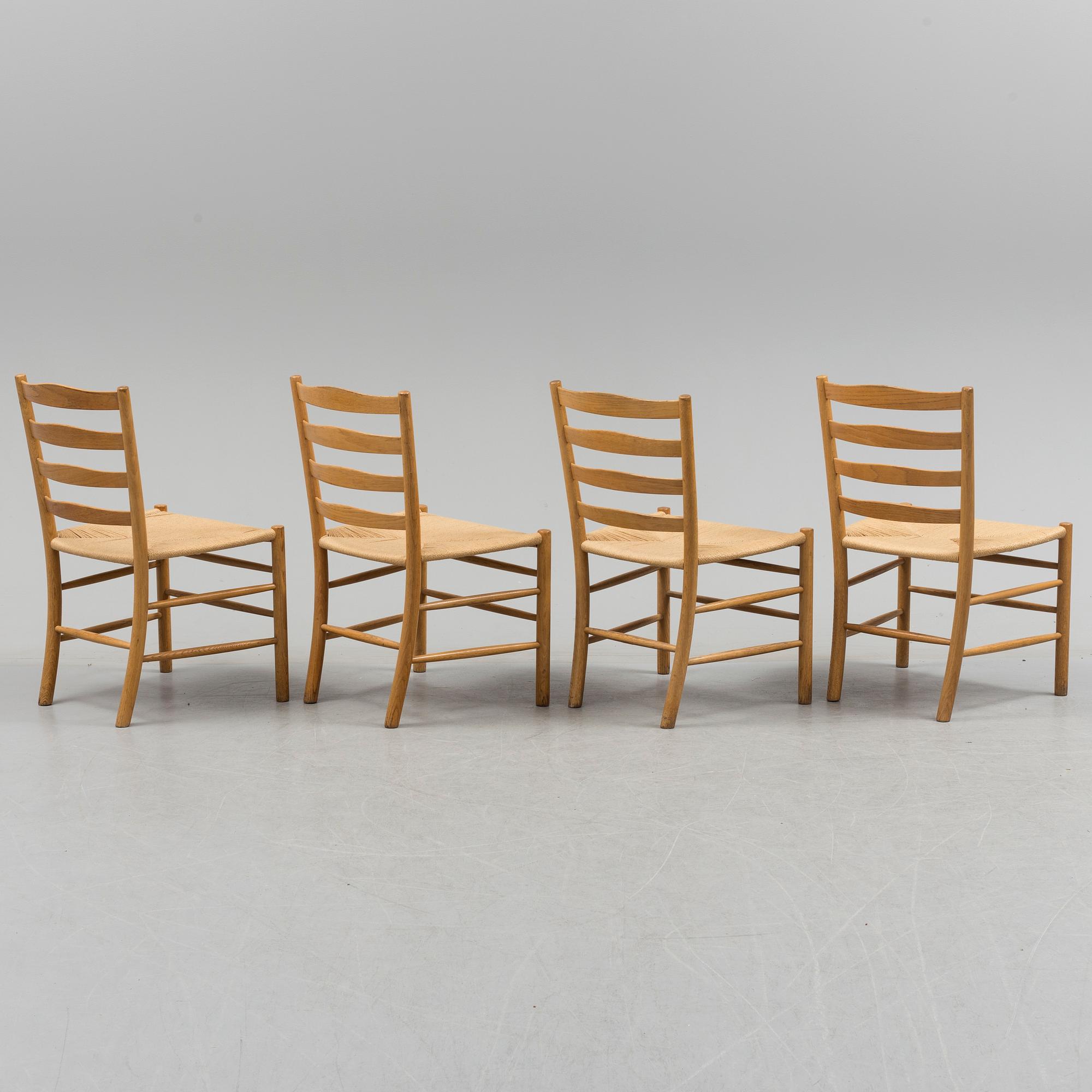 KAARE KLINT, four oak 'Kirkestolen' from Fritz Hansen, Denmark.