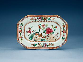 1581. A famille rose 'double peacock' serving dish, Qing dynasty, Qianlong (1736-95).