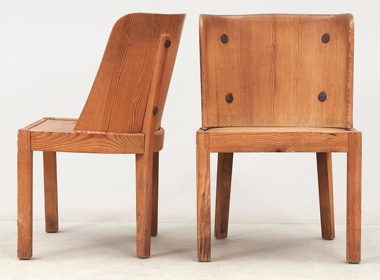 A pair of Axel Einar Hjorth 'Lovö' stained pine armchairs, Nordiska Kompaniet, 1930's.