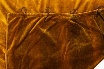A set of four yellow velvet curtains, 1910's/20's, ca 247 x 120 cm.