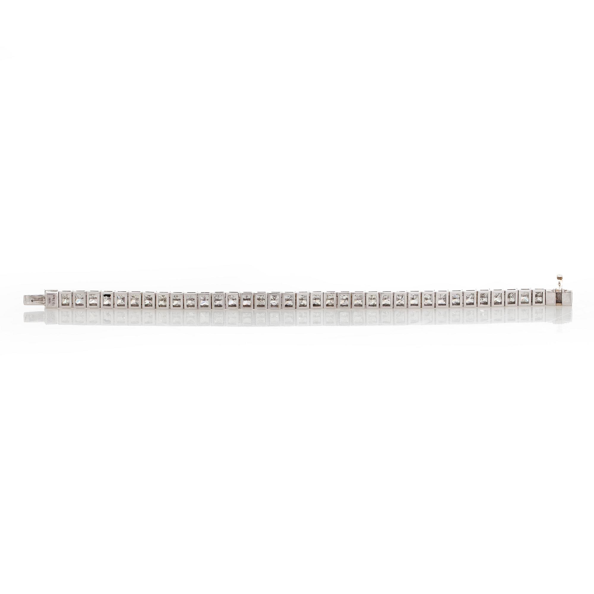 Tennis bracelet, princess cut diamonds c. 19.50 ct in total, 18K white gold.