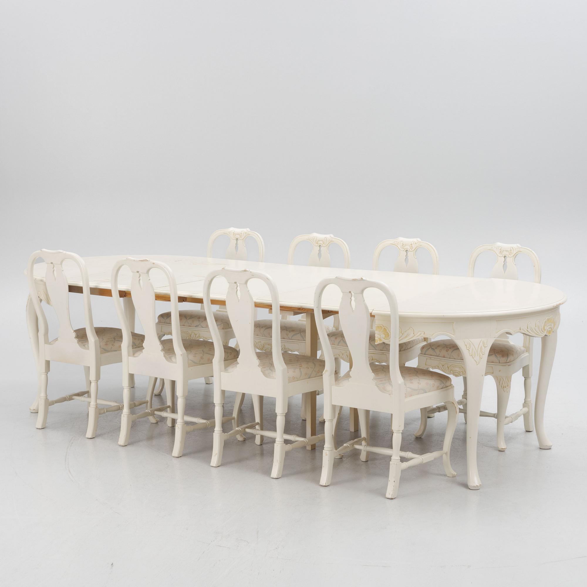 A Rococo style dining table with eight chairs, second half of the 20th century.