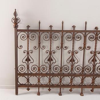 A cast iron fence around 1900.