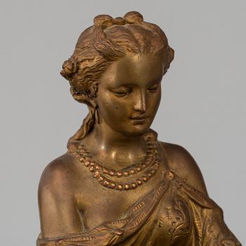 A  French 19th century mantle clock in Louis-XVI style.