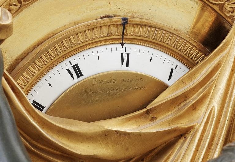 A French Empire early 19th Century mantel clock, "Amitié cachant les Heures", by Antoine André Ravrio and Porchez.