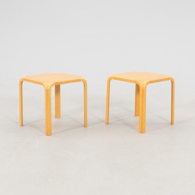 Alvar Aalto, stools/side tables, a pair model X601 Artek, latter half of the 20th century.