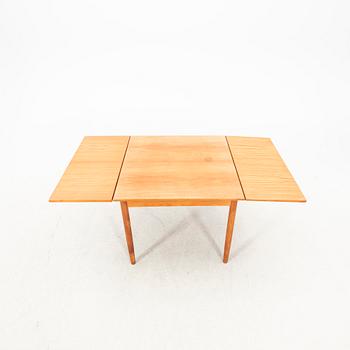 A teak table from the middle of the 20th century.