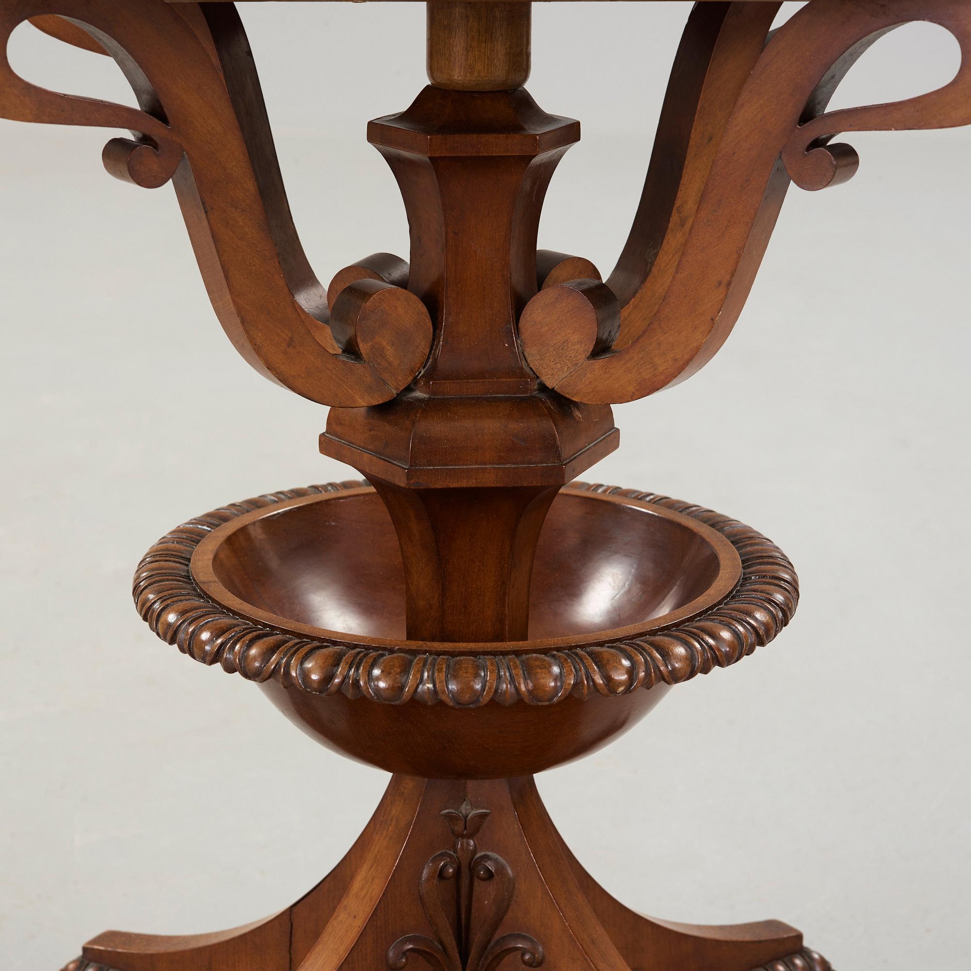 A Swedish Empire mahogny table.