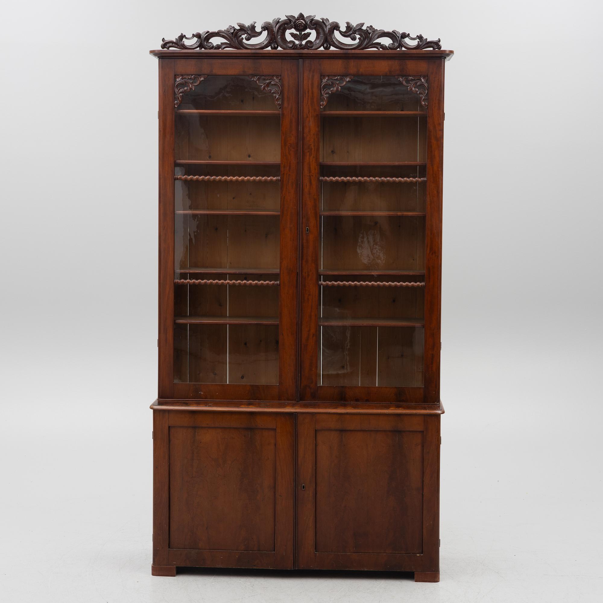 Empire, A late Empire book cabinet, first half of the 19th century.