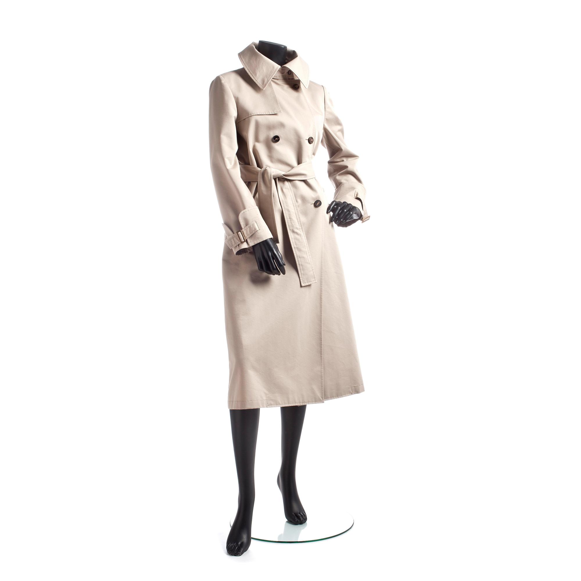 GUCCI, a beige cotton blend trenchcoat.