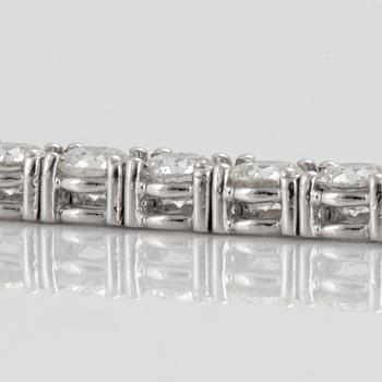 A line bracelet with 44 brilliant cut diamonds, total carat weight ca 7.73 cts. Quality ca G-H/VS-SI.