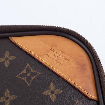 Louis Vuitton,  a monogram canvas 'Pégase 50' suitcase, 2003.