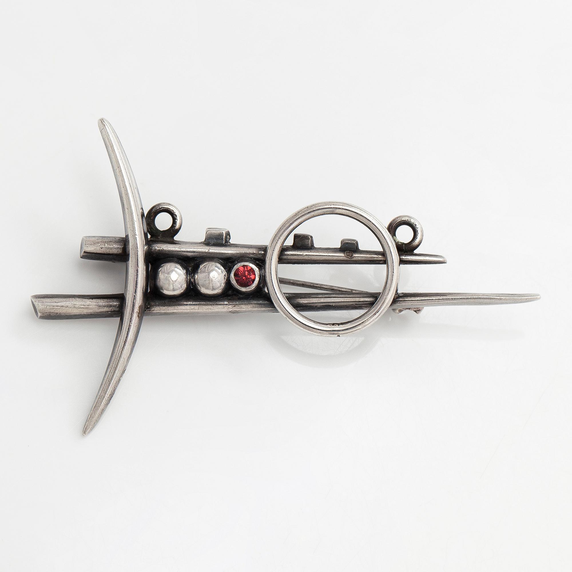 Heikki Kaksonen, brooch, faceted garnet, silver, Helsinki 1957.