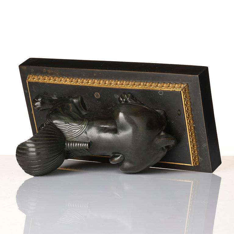 A French Empire bronze sfinx.
