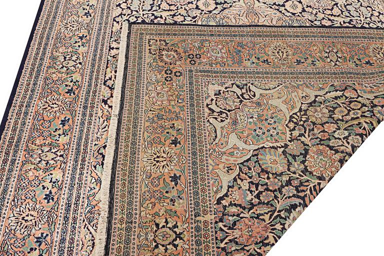 A Kashmir carpet, silk, c. 333 x 234 cm.