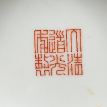 A pink sgraffitto bowl, Qing dynasty with Daoguangs mark in red.