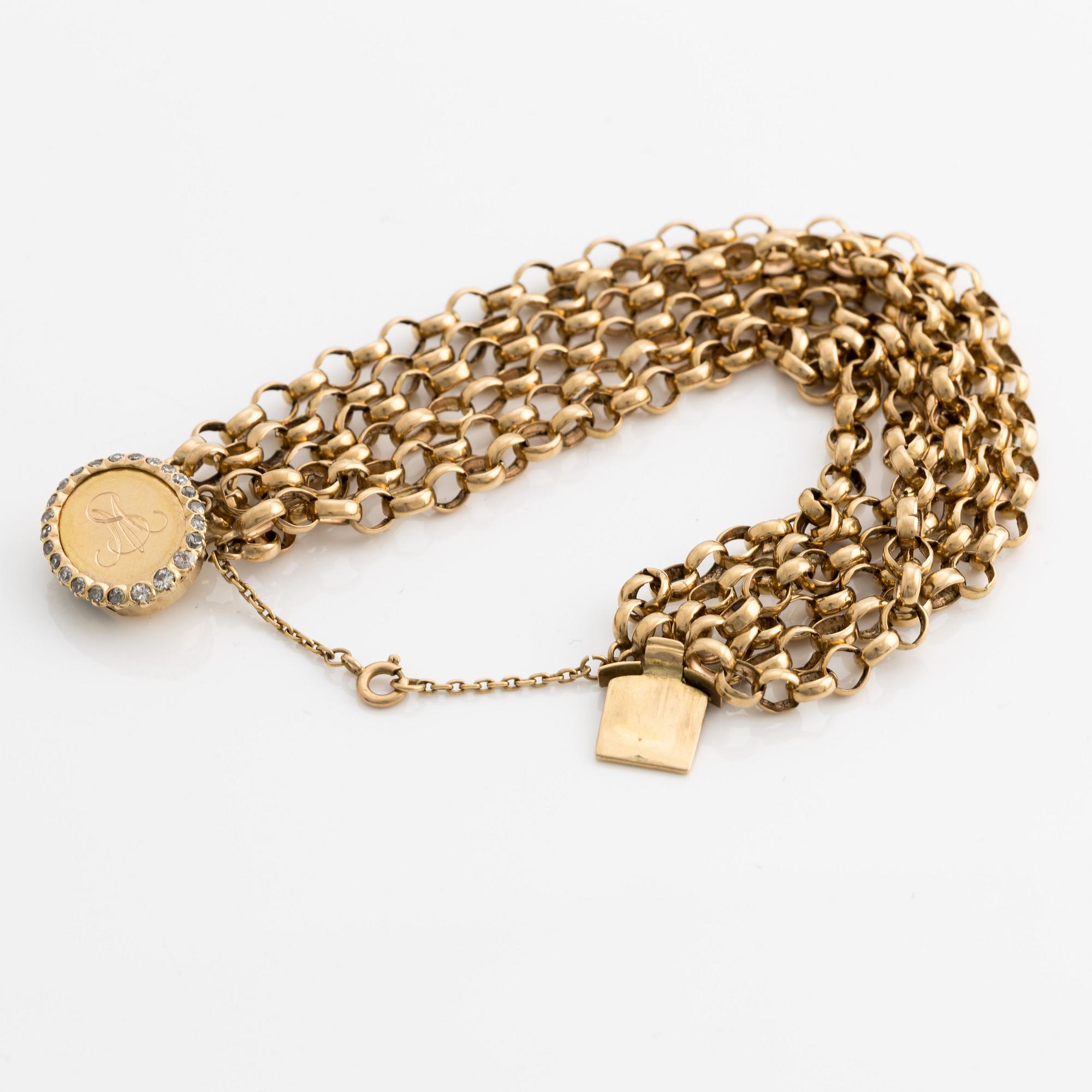 Bracelet, gold multi-strand pea links, monogram with frame of old-cut diamonds.
