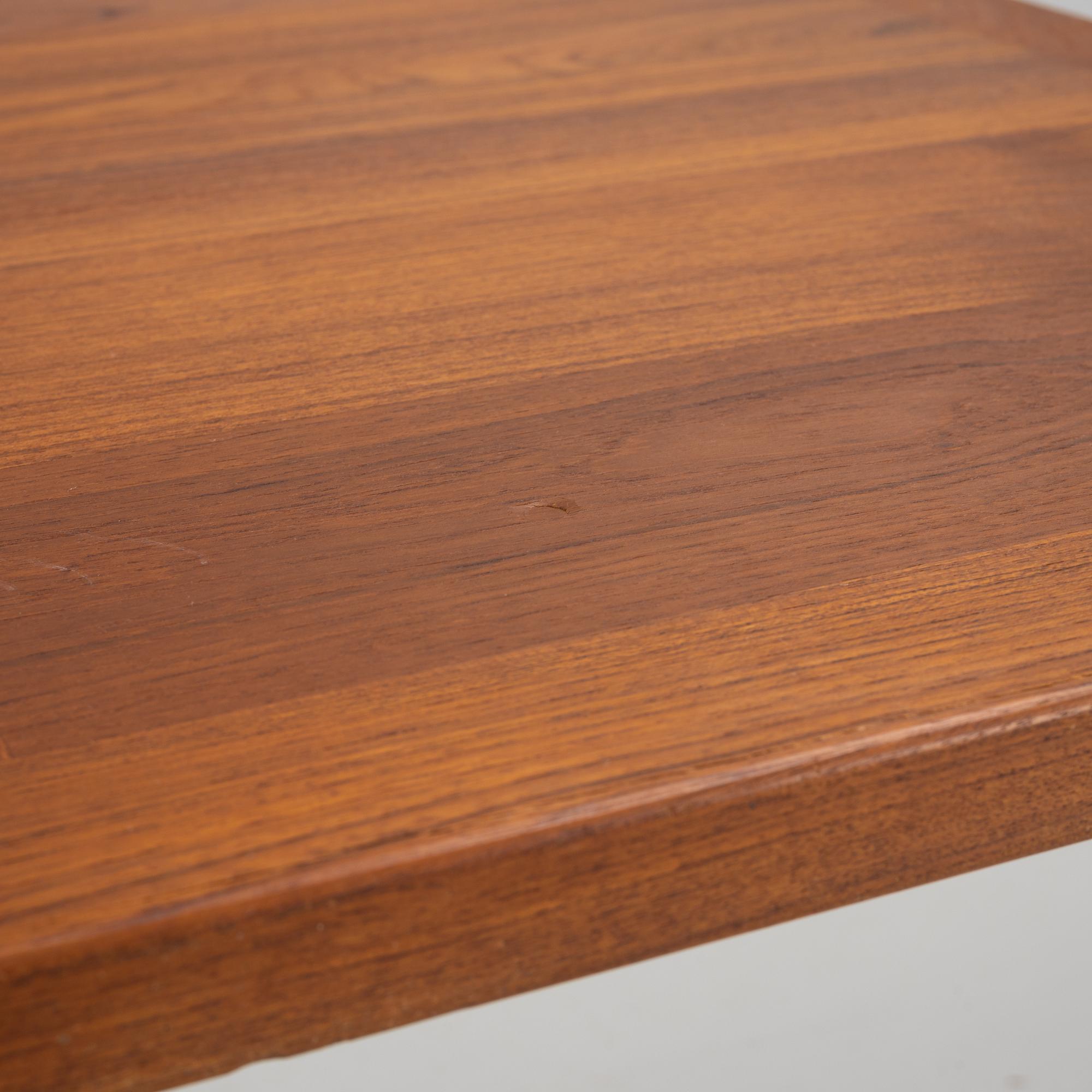 A teak Shaker style dining table, mid 20th Century.