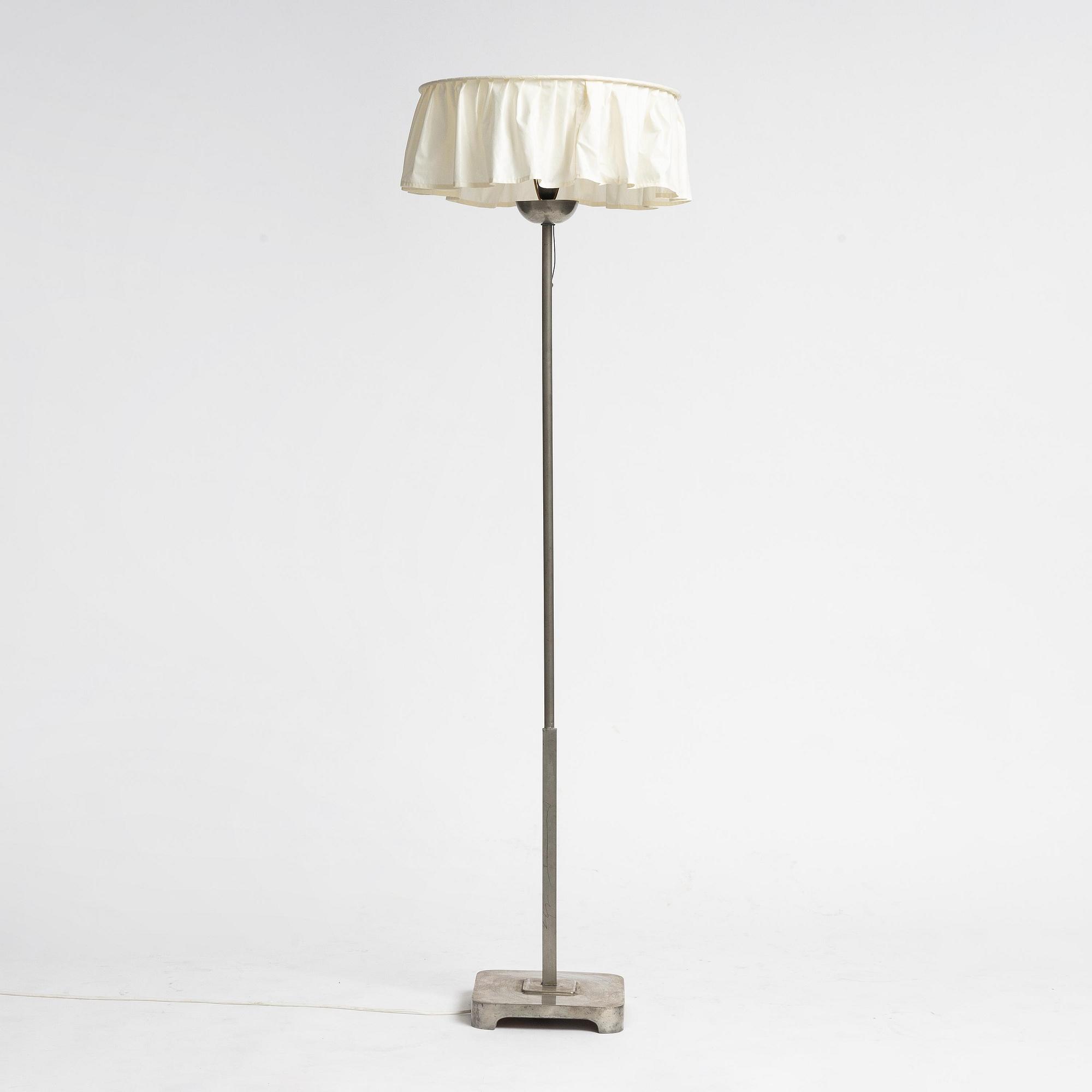 Uno Åhrén, a pewter floor lamp model "448", Firma Svenskt Tenn, Stockholm, 1930.