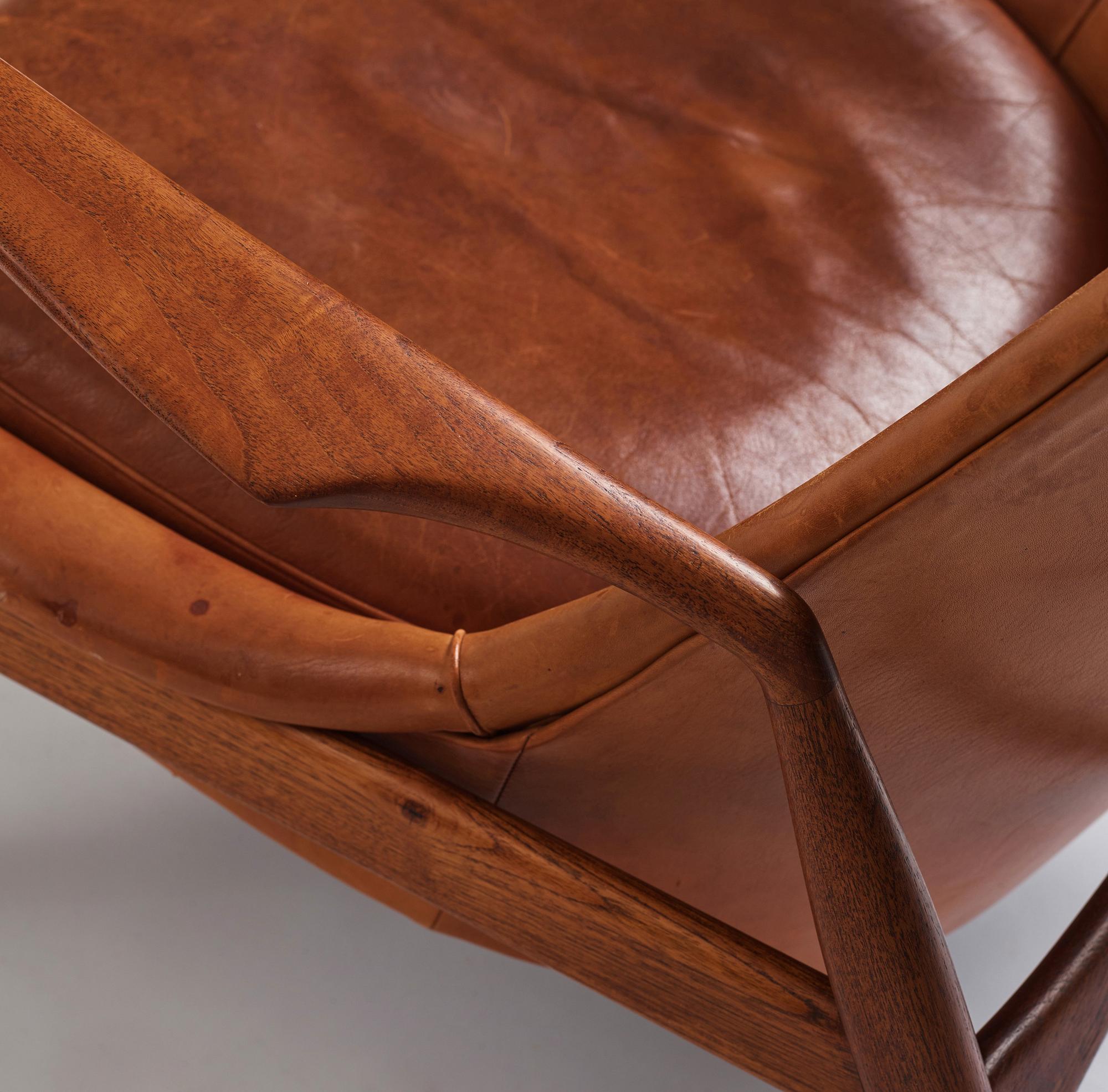 Ib Kofod-Larsen, a teak and cognac coloured leather 'Sälen' easy chair, Olof Perssons Fåtöljindustri (OPE), Sweden, 1950-60s.
