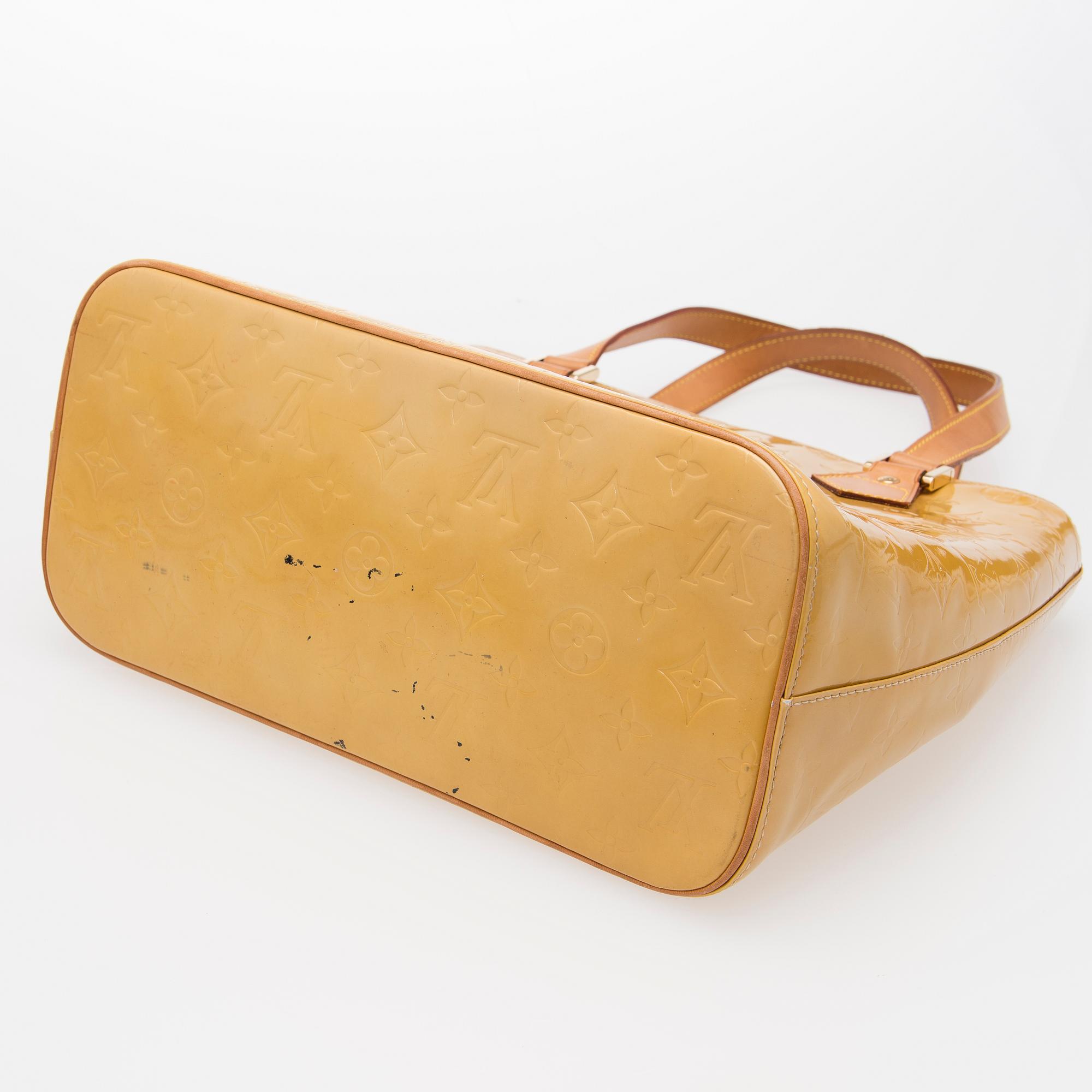 A Monogram Vernis Houston Bag.