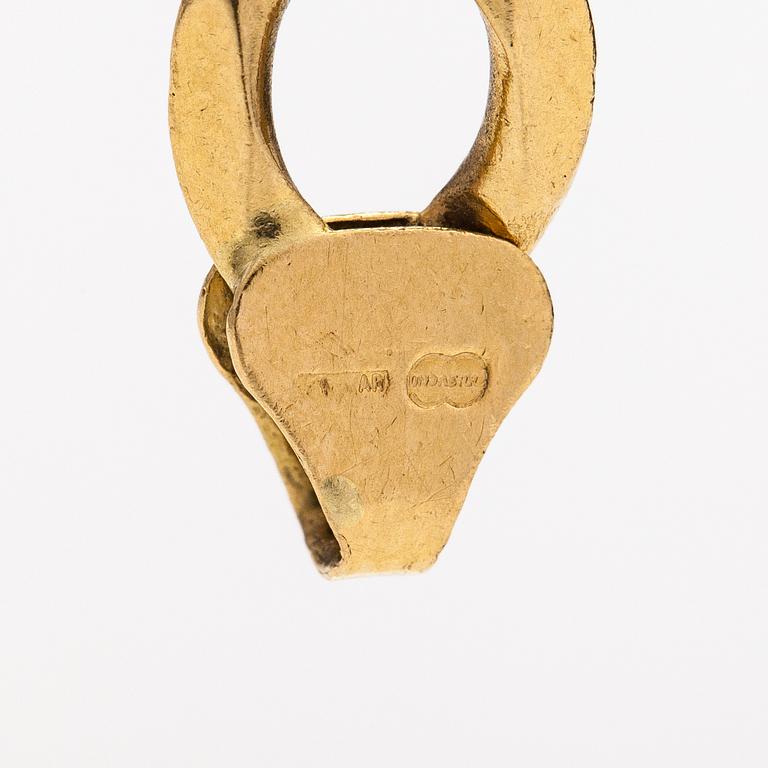 An 18K gold necklace. Unoaerre, Italy.