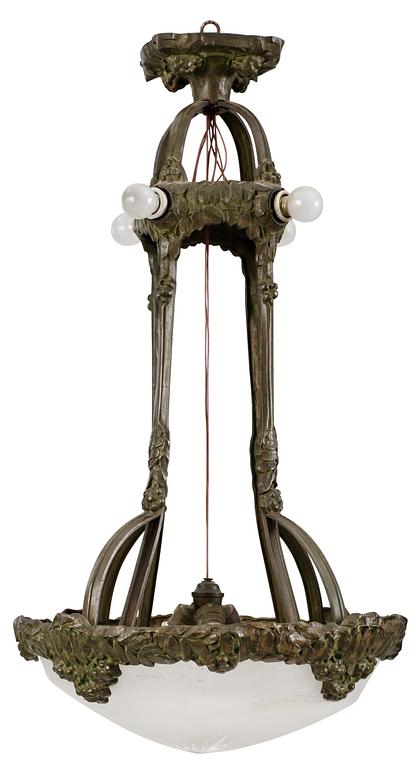 A Swedish patinated brass art noveau ceiling lamp by Böhlmarks.