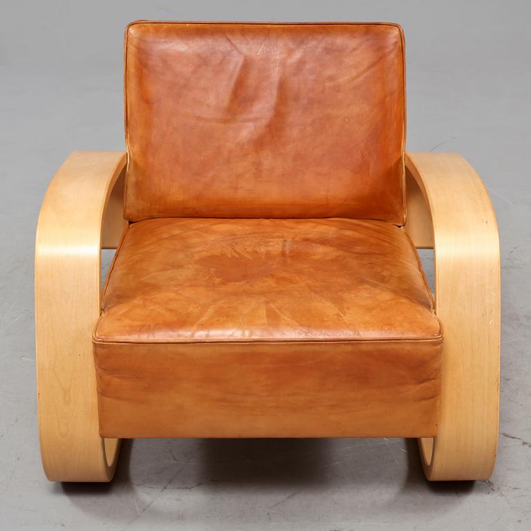 A pair of Alvar Aalto 'Nr 400' elk skin and birch armchairs, Artek, Finland.