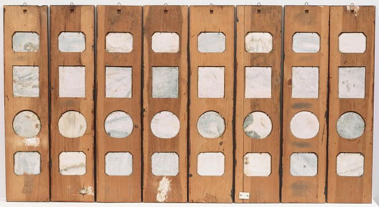 A set of eight panels with 32 dreamstone plaques, late Qing dynasty (1644-1912).