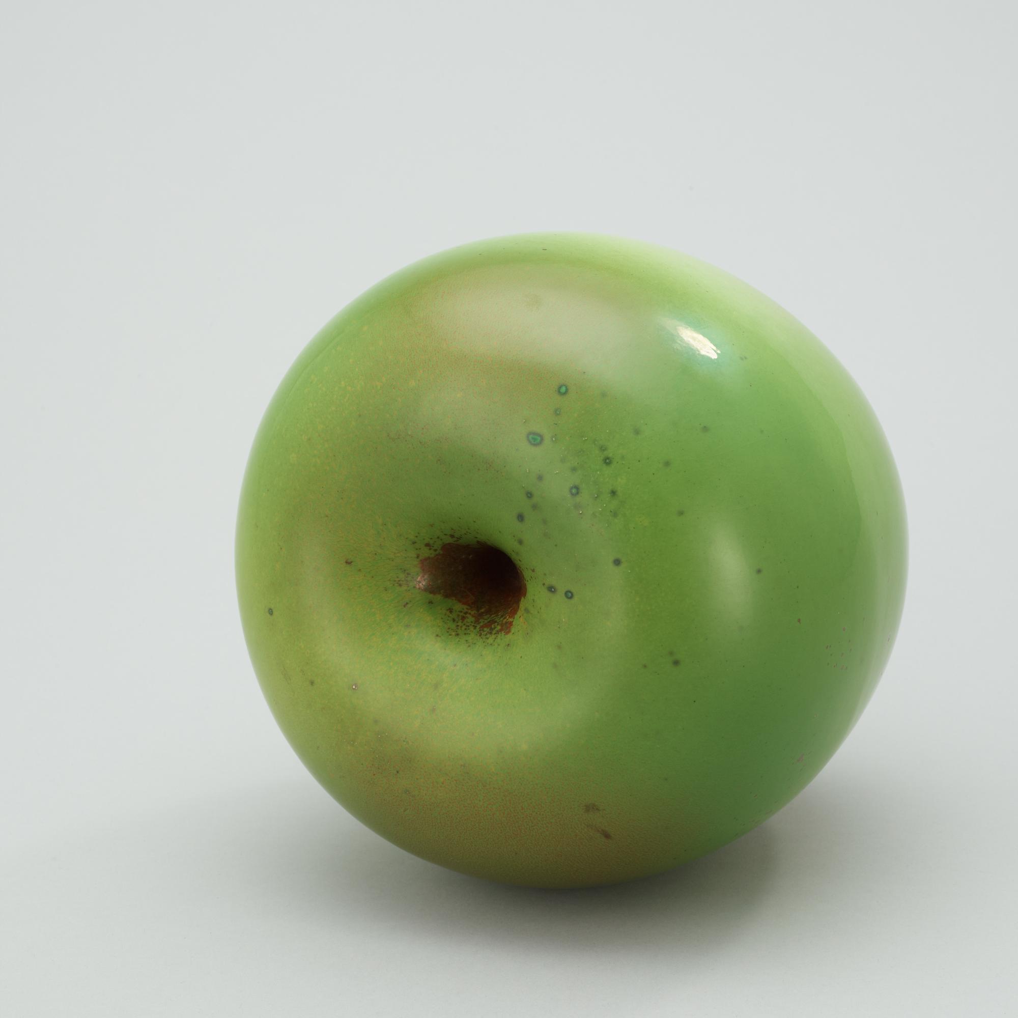 A Hans Hedberg faience apple, Biot, France.