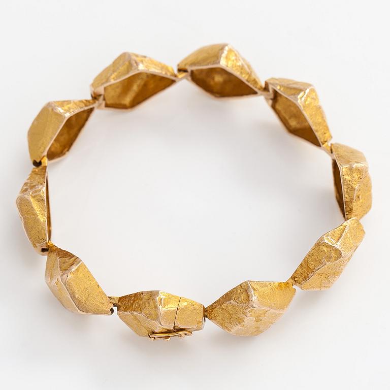 Björn Weckström, rannekoru, "Koskikivet", 14K kultaa.