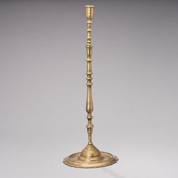 A 19th century ottoman brass candleholder.