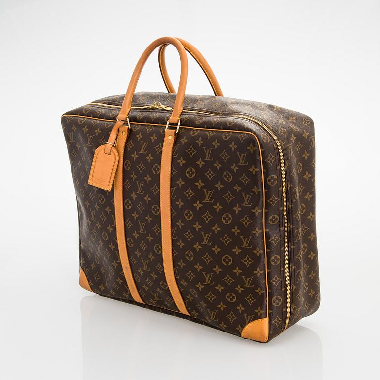 Louis Vuitton, A Monogram Canvas Sirius 55 Suitcase.