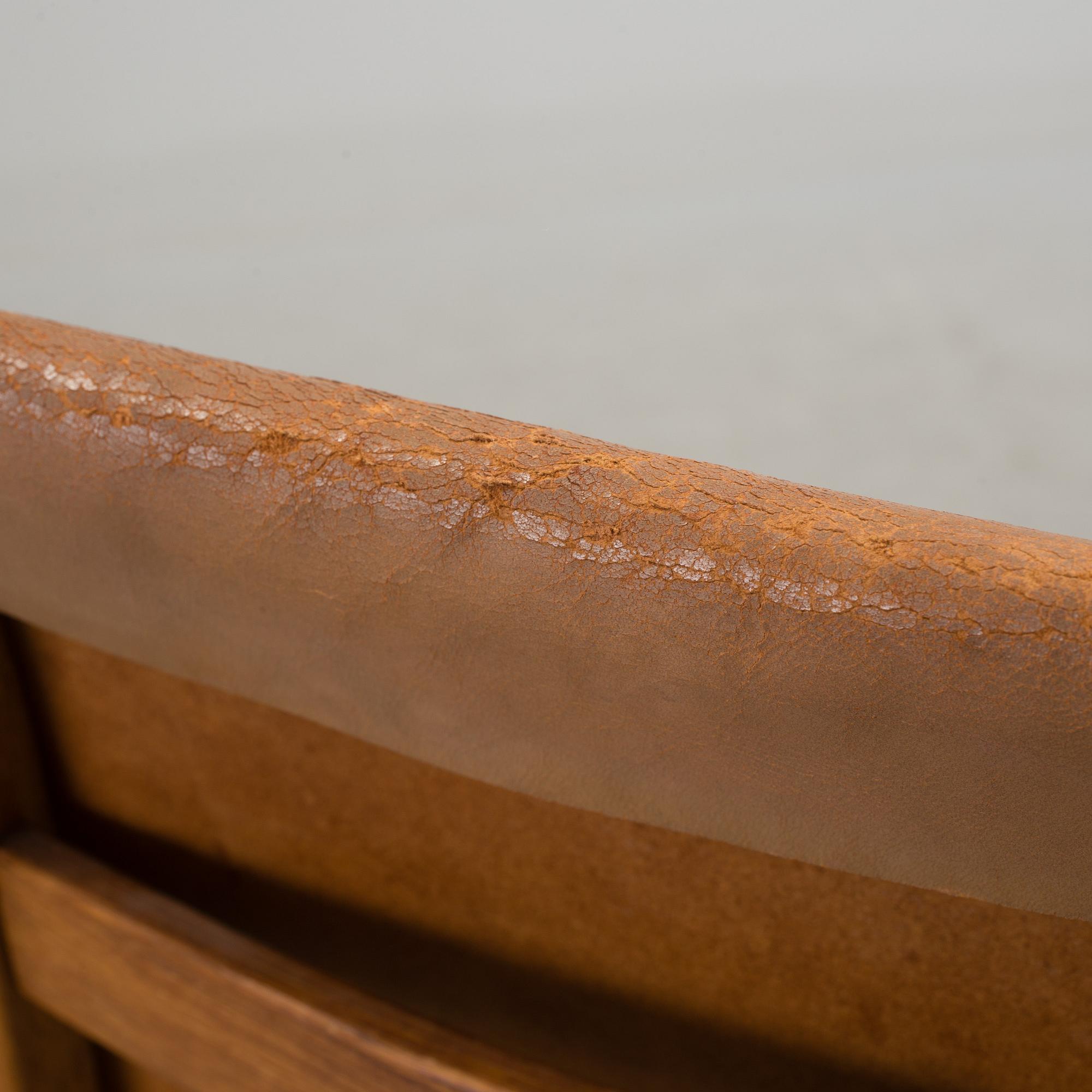 YNGVE EKSTRÖM, a 'Lamino' oak and teak easy chair from Swedese.