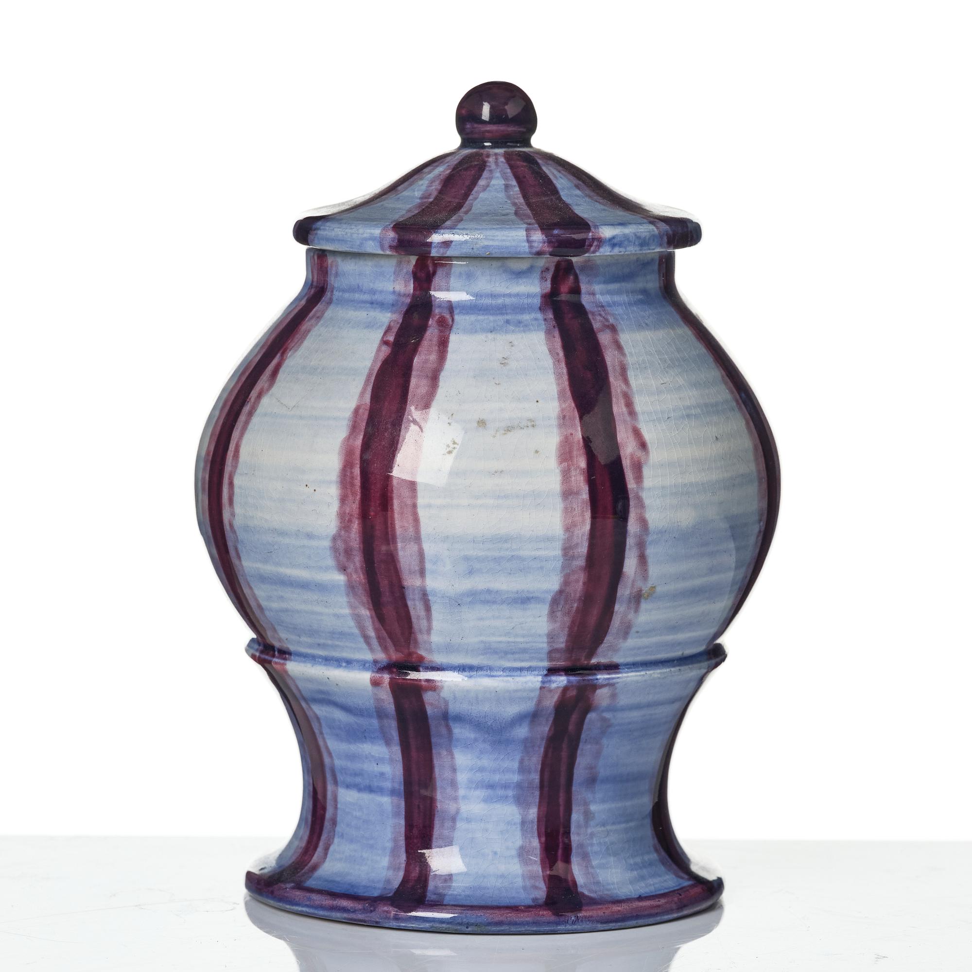 Wilhelm Kåge, a jar with cover, and four vases, creamware and porcelain, Gustavsberg, Sweden, 1917-1920.