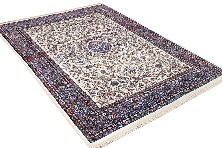 An oriental carpet, c. 308 x 220 cm.