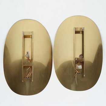 A pair of brass and glass wall sconces by Hans-Agne Jakobsson, Markaryd, second half of the 20th century.