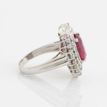 Ruby, baguette- and brilliant cut diamond ring.