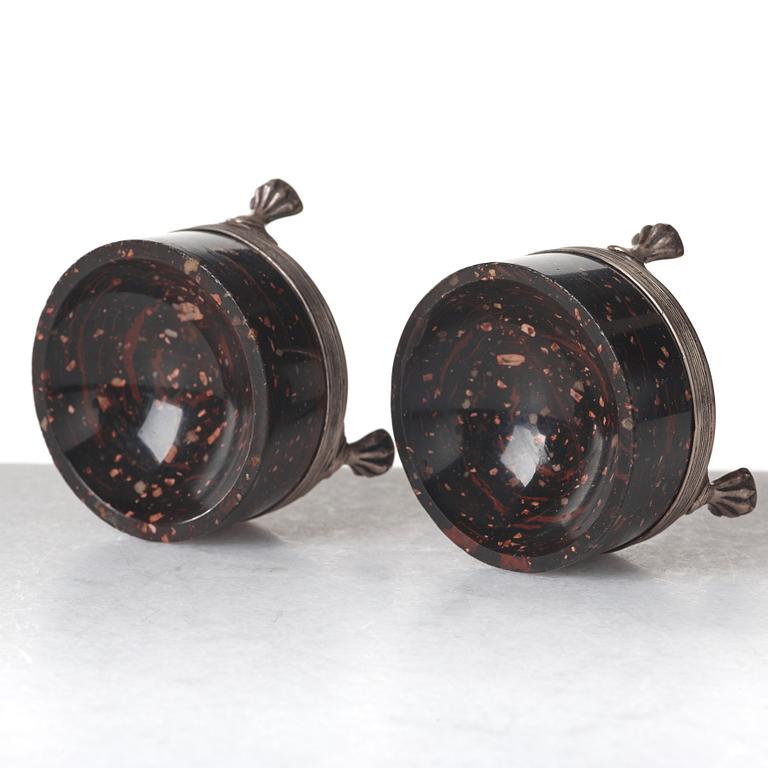 A pair of late Gustavian porphyry and silver salts. Silver maker's mark by Adam Tillström, Växjö 1799.