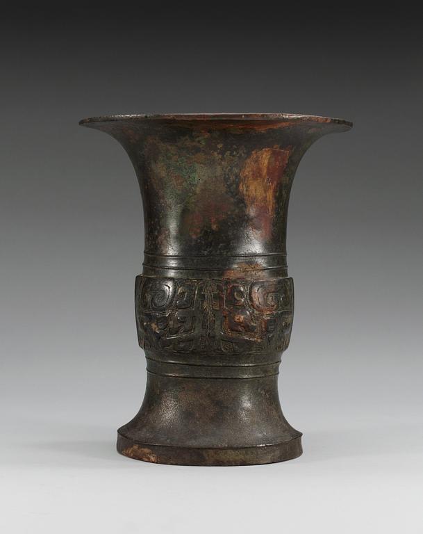 An archaic shaped bronze wine vessel, Tsun, in the style of Shang/early western Zhou style, presumably 17/18th Century.