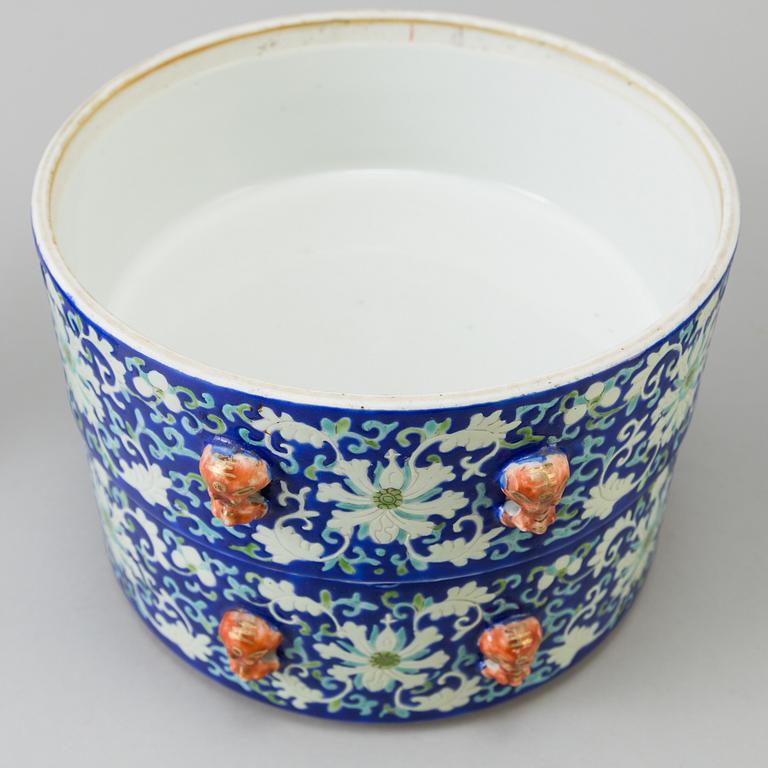 A Chinese polychrome porcelain food container, mid 20th century.