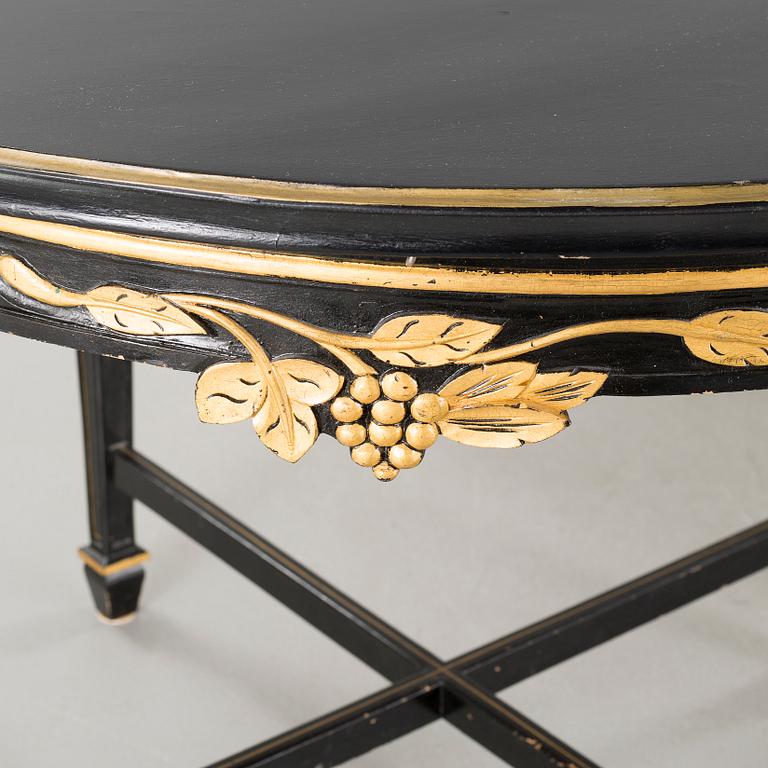 A gustavian style table and sofa, around the year 1900.