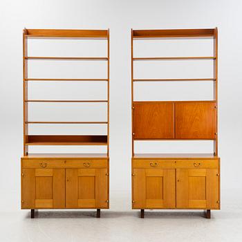 Josef Frank, two mahogany veneered bokkshelves, model 2112, Firma Svenskt Tenn, Sweden.