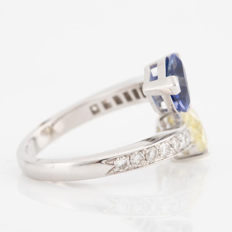 Ring, 18K white gold with a heart-shaped yellow diamond and sapphire, accompanied by GIA report.