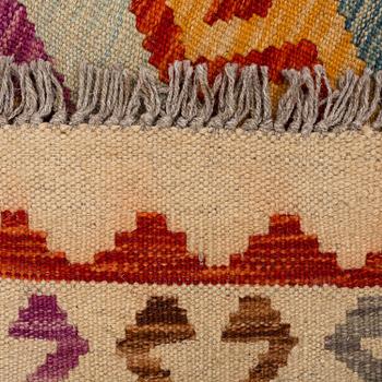 A CARPET, kilim, around 299 x 253 cm.