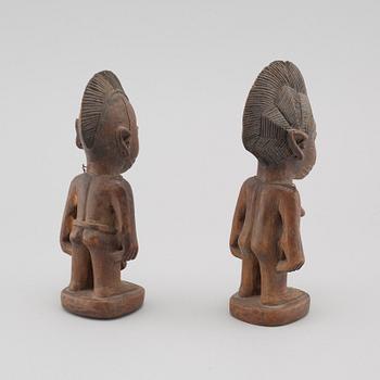 A pair of "Yoruba twins", Nigeria.