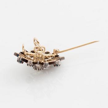 A 19th century gold and silver brooch/pendant set with old-cut diamonds.