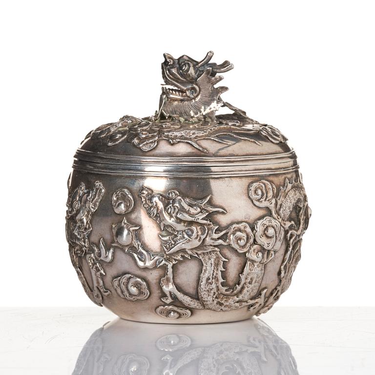 A Chinese Silver Dragon Bowl, mark of Wang Hing & Co, active c 1854-1925.