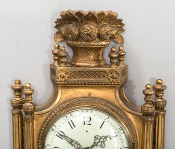 A late Gustavian style wall clock 20th century.